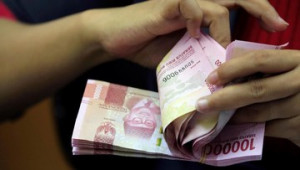Rupiah Menggeliat Menjelang Lelang  Obligasi AS