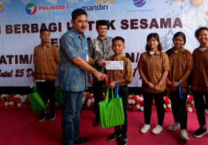 Pelindo I  Bank Mandiri dan AirNav Indonesia Bagi Bingkisan Natal dan Pasar Murah Di Tanjung Pinang