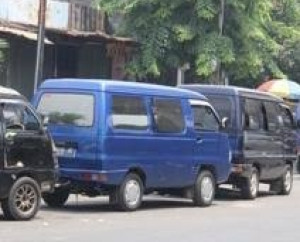Fenomena Angkutan Pelat Hitam di Indonesia